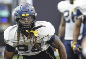 Running back Tony Mathis sticks with WVU, learning to 'just be a football player'